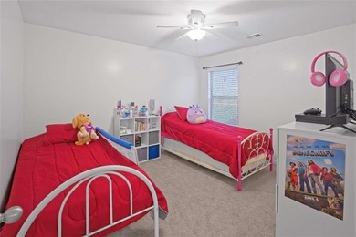 Welcome to effortless living in a serene Hampton neighborhood