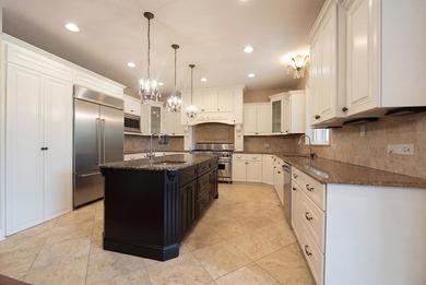 Nestled on a breathtaking lot, this CUSTOM home offers luxurious - photo 25