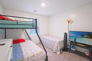 Welcome to effortless living in a serene Hampton neighborhood