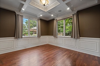 Nestled on a breathtaking lot, this CUSTOM home offers luxurious - photo 28