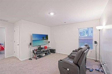 Welcome to effortless living in a serene Hampton neighborhood