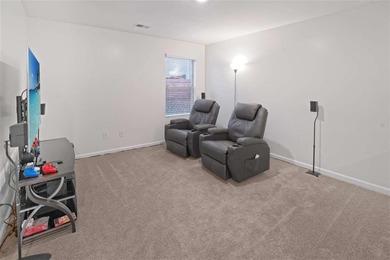 Welcome to effortless living in a serene Hampton neighborhood