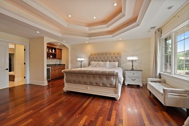 Nestled on a breathtaking lot, this CUSTOM home offers luxurious - photo 32
