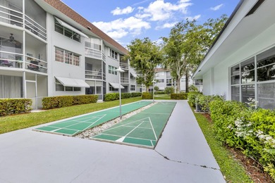 LOVELY EAST FACING UPDATED 2/2 second floor garden view unit in - photo 32