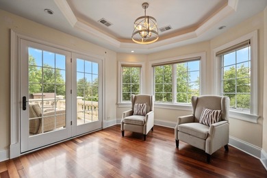 Nestled on a breathtaking lot, this CUSTOM home offers luxurious - photo 34