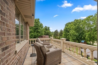 Nestled on a breathtaking lot, this CUSTOM home offers luxurious - photo 35