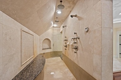 Nestled on a breathtaking lot, this CUSTOM home offers luxurious - photo 37