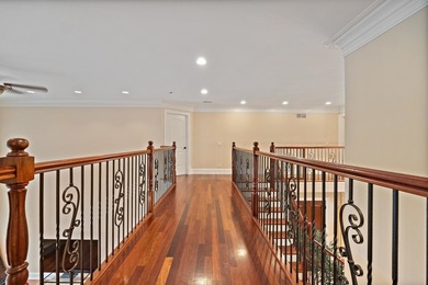 Nestled on a breathtaking lot, this CUSTOM home offers luxurious - photo 38