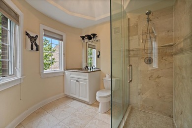 Nestled on a breathtaking lot, this CUSTOM home offers luxurious - photo 40