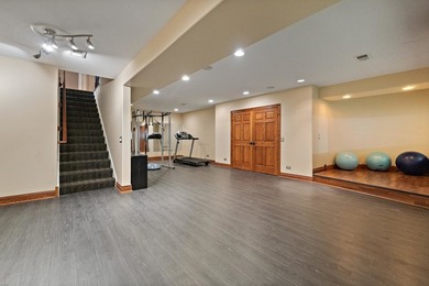 Nestled on a breathtaking lot, this CUSTOM home offers luxurious - photo 46
