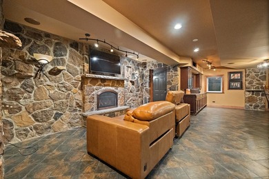 Nestled on a breathtaking lot, this CUSTOM home offers luxurious - photo 48