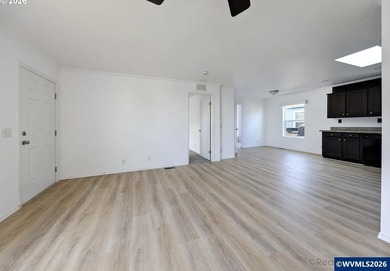 Tastefully updated and move-in ready, this bright home features