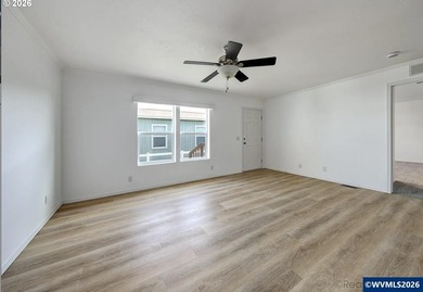 Tastefully updated and move-in ready, this bright home features