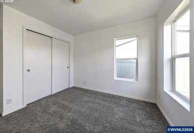 Tastefully updated and move-in ready, this bright home features