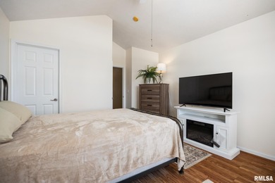 Welcome home to 4815 N. Weaverridge Boulevard! This 4-bedroom, 2