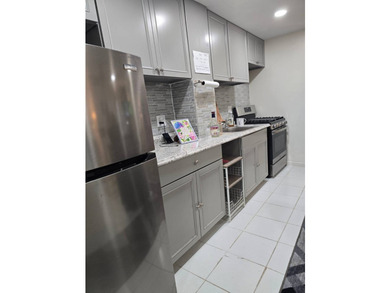 FOR SALE: MARINE PARK This home features a private driveway & - photo 8