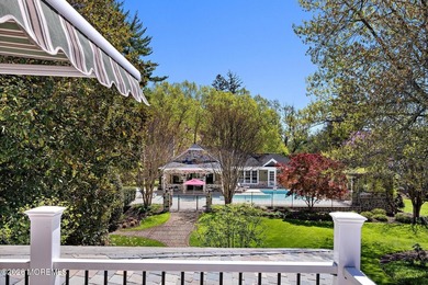 Beyond private gates, a tree-lined drive reveals Turtle Pond - photo 25