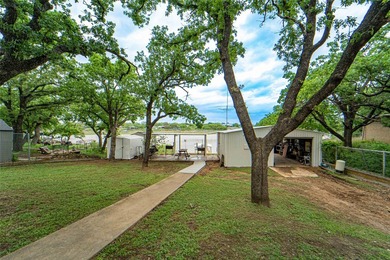 Beautifully remodeled waterfront home on Hubbard Creek Lake in - photo 25