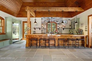 Beyond private gates, a tree-lined drive reveals Turtle Pond - photo 32