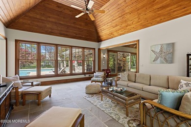 Beyond private gates, a tree-lined drive reveals Turtle Pond - photo 34