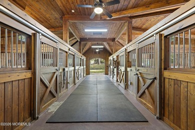 Beyond private gates, a tree-lined drive reveals Turtle Pond - photo 43