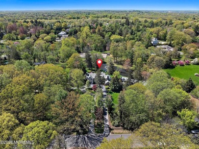Beyond private gates, a tree-lined drive reveals Turtle Pond - photo 51