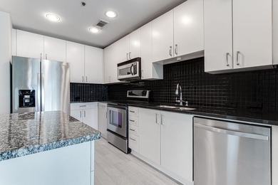 This unique condo offers open-concept living with direct access