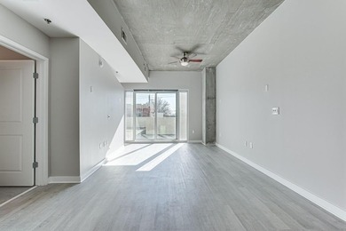 This unique condo offers open-concept living with direct access
