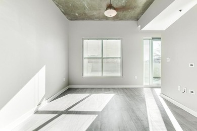 This unique condo offers open-concept living with direct access