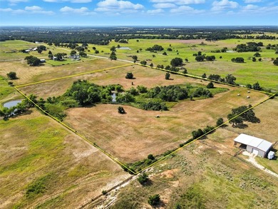 This 11-acre property offers the perfect spot to build your - photo 3