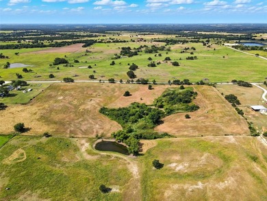 This 11-acre property offers the perfect spot to build your - photo 4