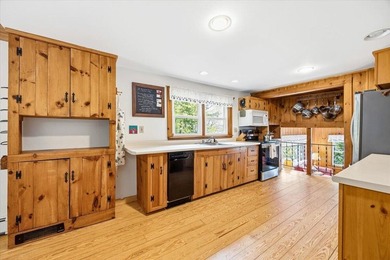 Located on Long Lake in Harrison, Maine, this exceptional - photo 11