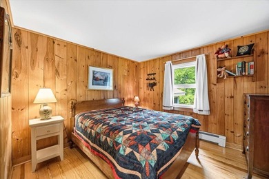Located on Long Lake in Harrison, Maine, this exceptional - photo 14