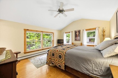 Located on Long Lake in Harrison, Maine, this exceptional - photo 16