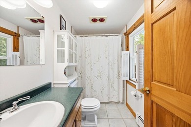 Located on Long Lake in Harrison, Maine, this exceptional - photo 18
