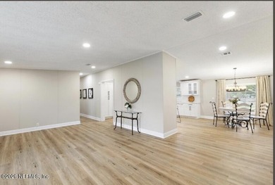 This gorgeous 5 bedroom, 3 full bath home is located an acre! In - photo 4