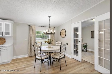 This gorgeous 5 bedroom, 3 full bath home is located an acre! In - photo 5