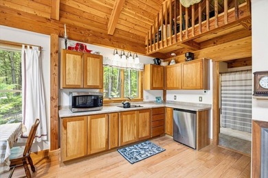 Located on Long Lake in Harrison, Maine, this exceptional - photo 46