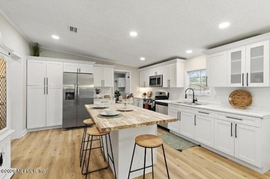 This gorgeous 5 bedroom, 3 full bath home is located an acre! In - photo 6