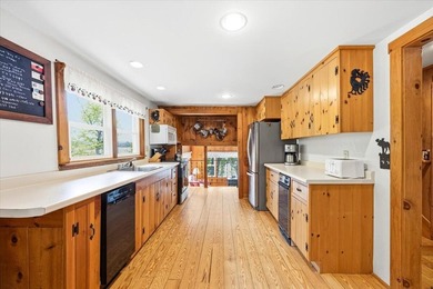 Located on Long Lake in Harrison, Maine, this exceptional - photo 47
