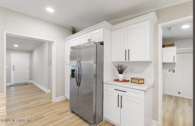 This gorgeous 5 bedroom, 3 full bath home is located an acre! In - photo 7