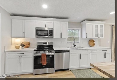 This gorgeous 5 bedroom, 3 full bath home is located an acre! In - photo 8