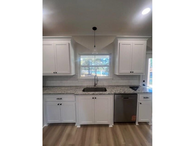 ON THE WATER!!! This beautiful new construction home offers a - photo 10