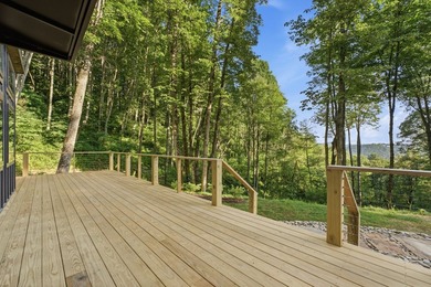 Perched on 1.12 private acres, this custom-built Timbercraft - photo 11