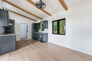Perched on 1.12 private acres, this custom-built Timbercraft - photo 15