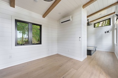 Perched on 1.12 private acres, this custom-built Timbercraft - photo 22
