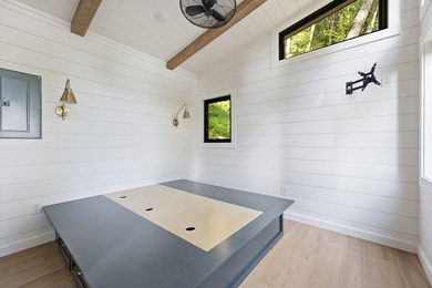Perched on 1.12 private acres, this custom-built Timbercraft - photo 24