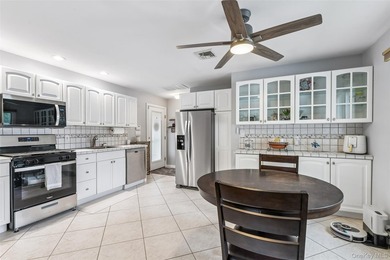 Fantastic Opportunity in Harborfields SD! Pristine Split-Level - photo 24