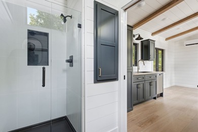 Perched on 1.12 private acres, this custom-built Timbercraft - photo 29