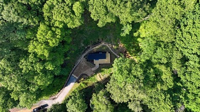 Perched on 1.12 private acres, this custom-built Timbercraft - photo 30